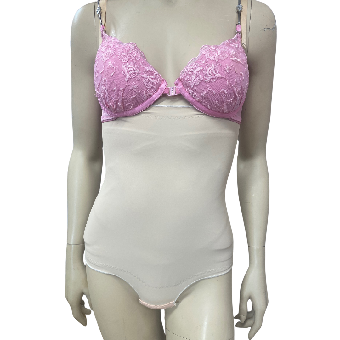 Mannequin wearing Cincher Bodysuit with pink bra